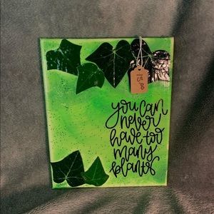 Acrylic pour on a 8x10 canvas, with fake leafs